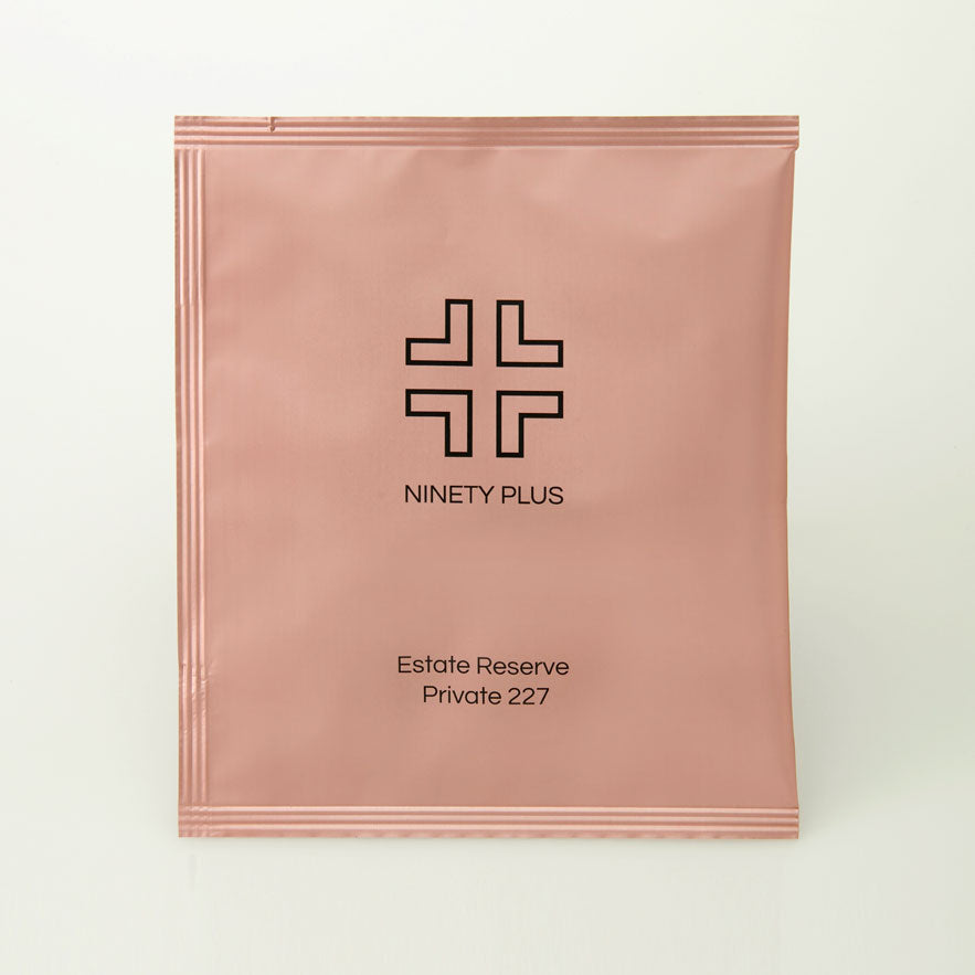 Pink packaging with 'Ninety Plus' logo and text on a white background