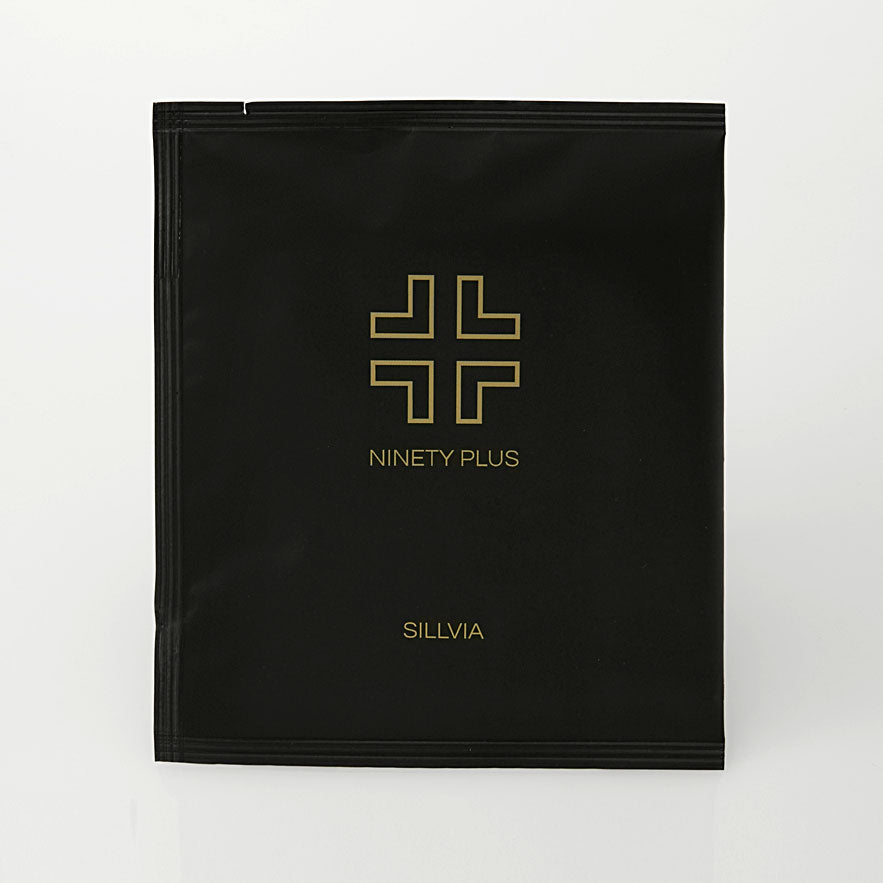 Black pouch with gold logo and text on a white background