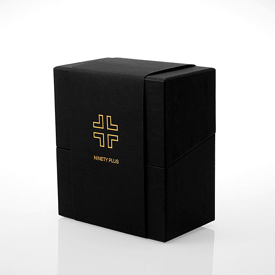 Black box with gold logo and text on a white background