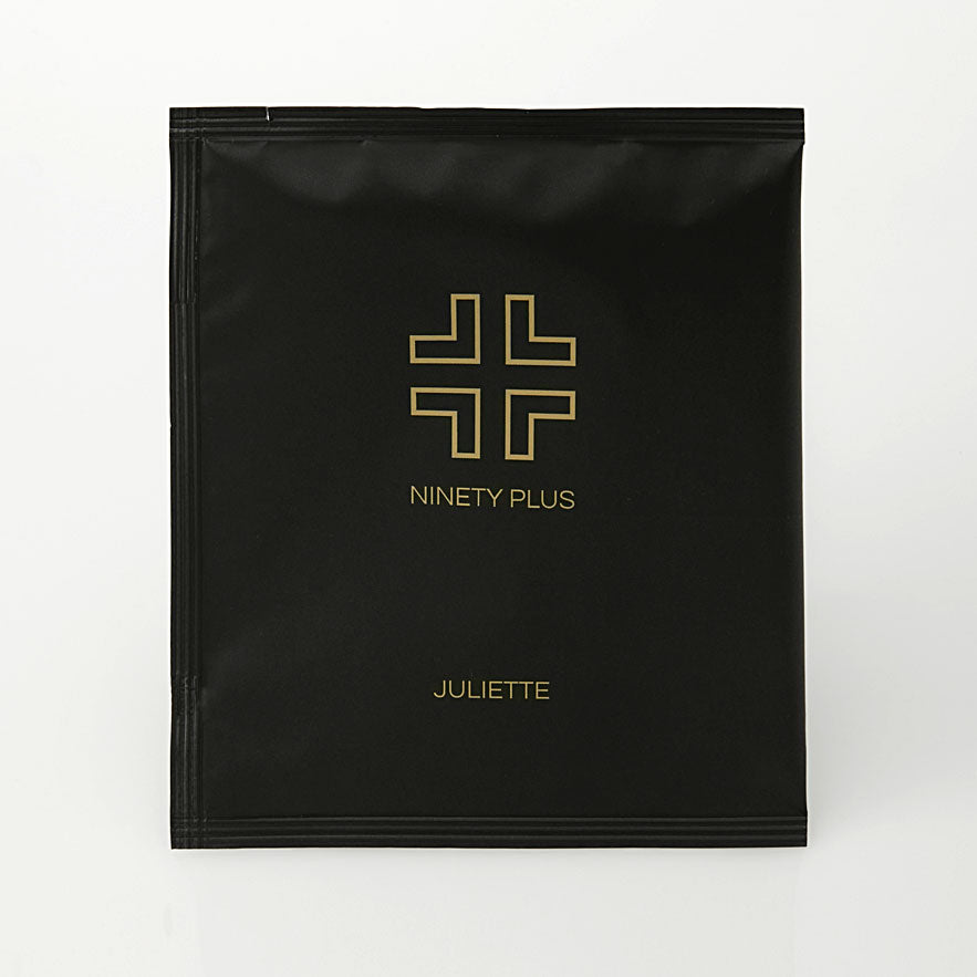 Black package with gold logo and text on a white background