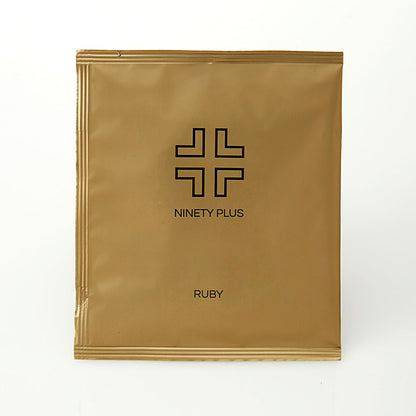 Gold packaging with 'Ninety Plus' logo and 'Ruby' text on a white background